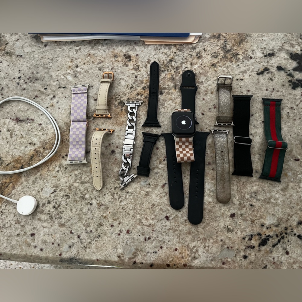 Apple Watch Series 3 42mm- GPS + Cellular GREAT condition with charger & 9 bands